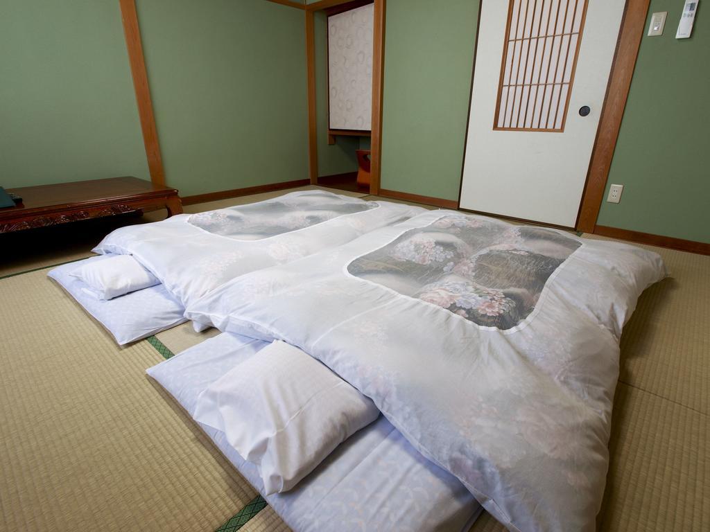 Sazu Onsen Yusho Hotell Kami  Rom bilde